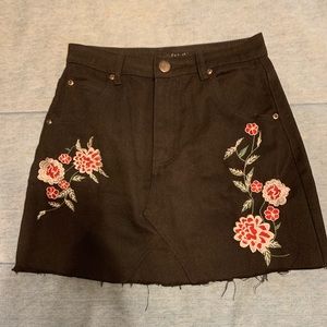 black denim skirt with flower embroidery
